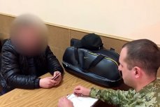 Допрос российского полицейского украинским пограничником