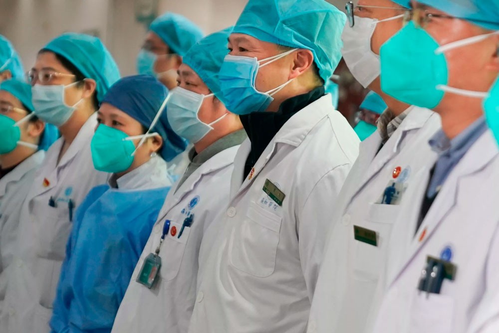 Китайские медицинские работники, которые борются с коронавирусом